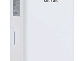 a white refrigerator with the word okyuk written on it