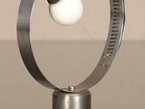 a metal object with a white ball inside of it