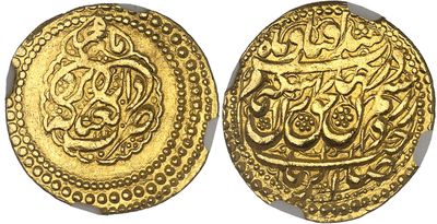 two gold coins with arabic writing on them