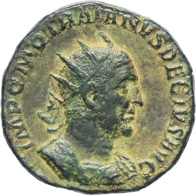 an ancient roman coin with a head of a man wearing a crown