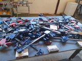 a large pile of tools sitting on top of a table