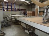 an image of a machine shop with a lot of wood