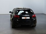 a picture of a black car parked in a room