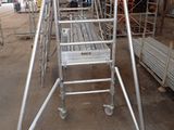 a ladder that is sitting in the middle of a building