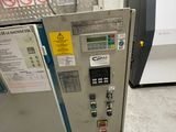 a machine that is sitting on the floor in a room