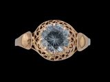 une image d'une bague en or avec une pierre en topaze bleue