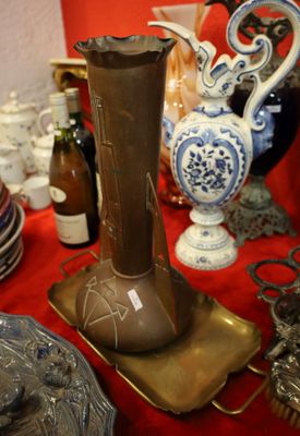 many different vases and plates on the table