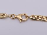 a gold chain bracelet with a clasp on a white background