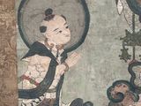 a painting on the wall of a building with a woman holding a fan