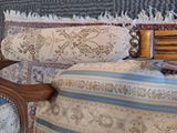 an image of a chair with a pillow and a knife on it