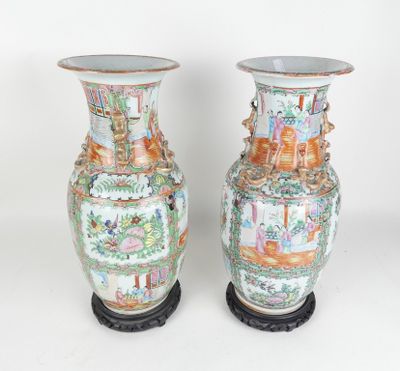 pair of chinese vases on pedestal on white background with white background