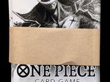 a close up of a box of one piece card game on a black background