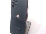 the back of a black samsung galaxy s9 with a camera attached to it