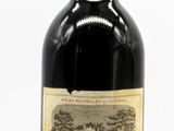 a bottle of wine that is sitting on a table