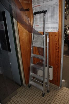 a ladder leaning up against a wall in a room