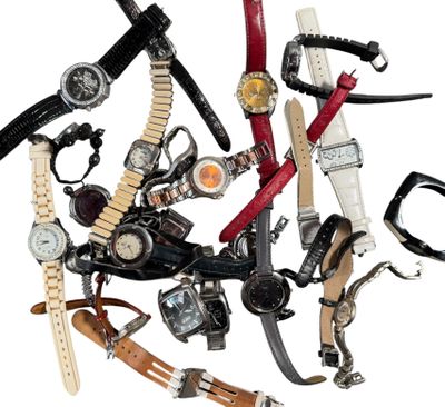 many different types of watches on a white surface