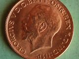 a penny that is on a table with a green surface
