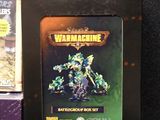 a box of warhammers cards on a table