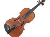 an old violin on a white background with a white background
