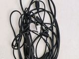a black cord that has been tangled up on a table