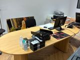 an image of a conference room with a large table
