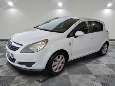 a picture of a white car parked in a garage