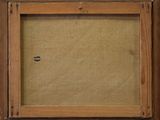 an old picture of a picture frame with a small hole in it