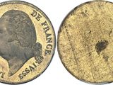 a gold coin with a picture of a man on it