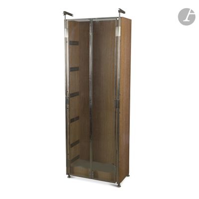 an image of a metal and wood cabinet with a glass door