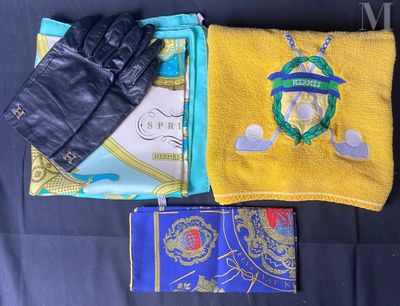 a yellow towel, a black glove, and a passport on a black surface