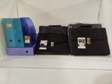 three briefcases sitting on a shelf next to each other