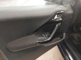 the interior of a car with the door open showing the interior of the vehicle