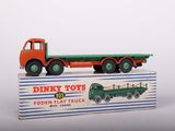a toy truck that is sitting on top of a box