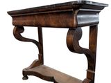 an image of a wooden table with a shelf underneath it