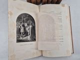 an open book with a picture of a man and a woman on it