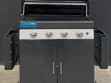 an image of a bbq grill with two burners on a pallet