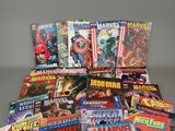 a lot of comic books sitting on a table