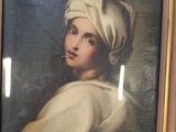 tableau représentant une femme portant un turban blanc, dans un cadre doré