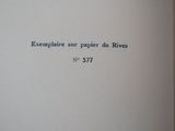 an open book with the words exemplaire sur papier de rives written on it