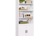 an image of a white bookcase with books on it