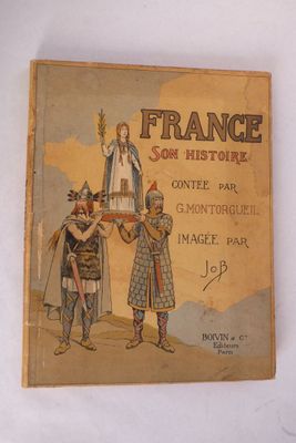 un vieux livre sur lequel figure l'image d'un homme et d'une femme debout l'un à côté de l'autre