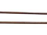 pair of two wooden chopsticks on a white background