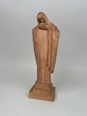 an image of a statue of a man with a robe on