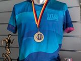 a mannequin with a medal and a shirt on display