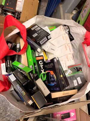 a box full of electronic devices and other electronic gadgets