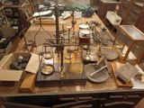 a table that has a lot of old items on it