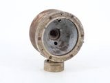 a small metal object that is on a white surface