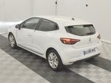 a picture of a white car parked in a garage