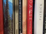 many books that are on a shelf together