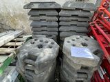 a pile of concrete blocks sitting on the ground